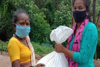 An old lady walked for miles to collect a grocery kit