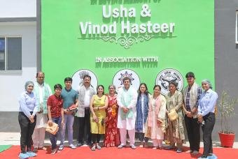 Dignitaries at the inauguration of kitchen at Barsana 